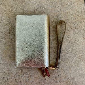 Halogen gold wristlet.